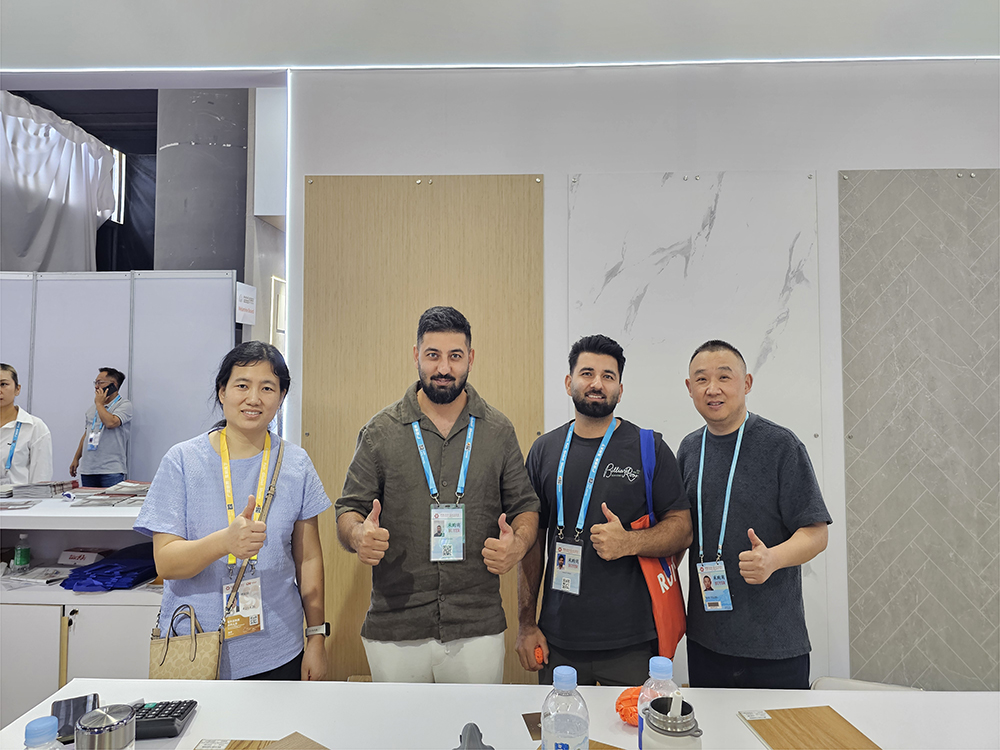 salesperson-and-customer-pose-for-a-photo.jpg